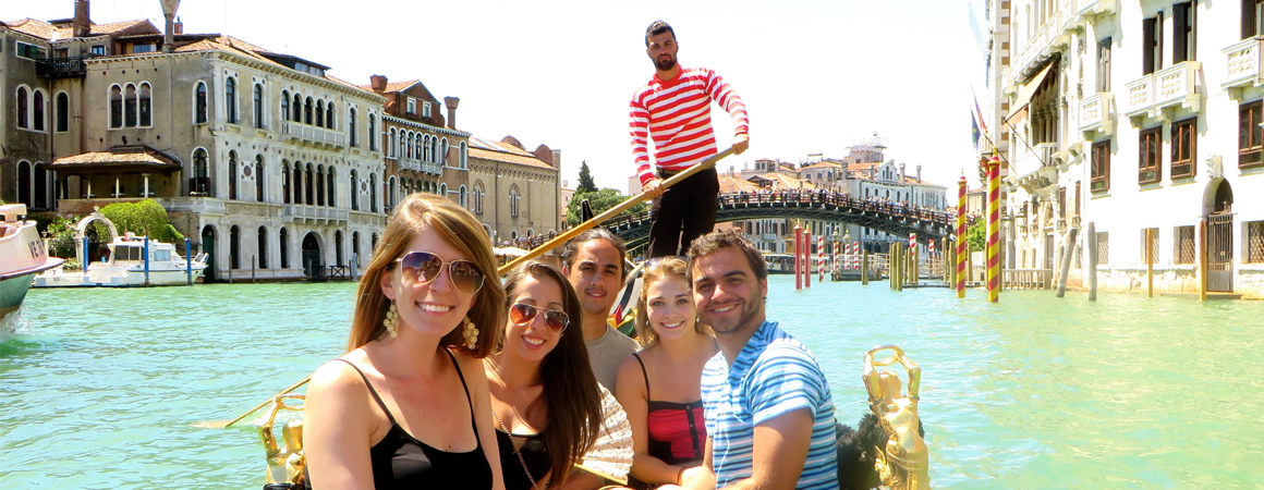 Students riding in a gondola in Venice